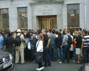 hotel Since it is U2 day, we're taking a pilgramage of sorts-here are the crowds waiting outside The Clarence Hotel- a really cool hotel on the edge of Temple Bar, owned by the boys in the band. And the limo they're surrounding is a decoy, but I didn't have the heart to tell them.