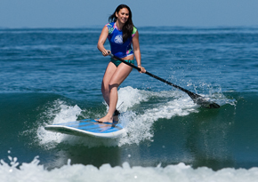 Surf Diva What'SUP Surf School, Head Instructor Leohoonani Reyes | Photo by Will Parson | Property of Surf Diva